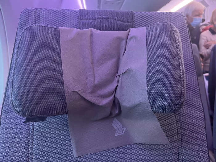 In fact, after flying economy on the second leg to Singapore, I found I slept better because the headrests folded all the way in and my neck felt supported.