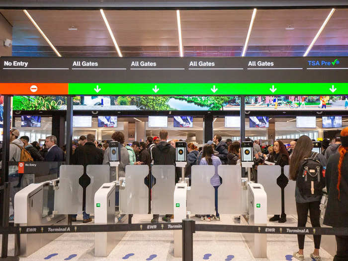 And the 16 lanes of Transportation Security Administration checkpoints were located just behind the long rows of check-in counters and kiosks.