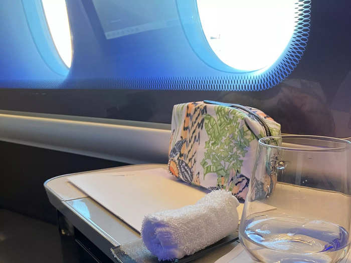 Before takeoff, staff offered me a hot scented towel on a little glass plate. Some of the perks, like a towel on a plate, felt a little absurd.