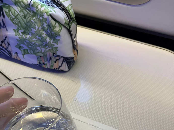 I was also offered a drink before takeoff, the flight attendant suggested champagne or orange juice, but I went for water to stay hydrated. The drink came on a linen coaster, another weirdly luxurious quirk.