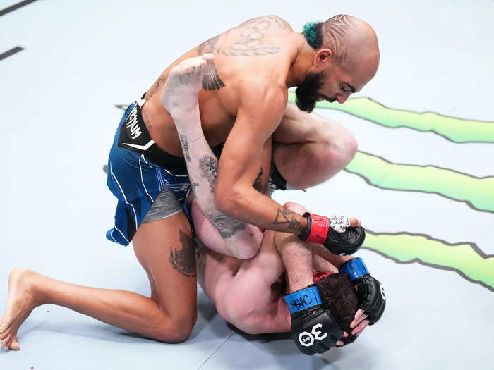 Charles Johnson finished Jimmy Flick in the first round of a flyweight fight that reintroduced fans to the UFC after a four-week hiatus over the holidays.