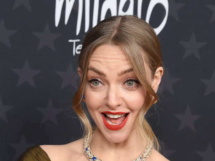 Amanda Seyfried, who skipped the Golden Globe Awards last week, posed for photographers before taking home the award for best actress in a limited series.