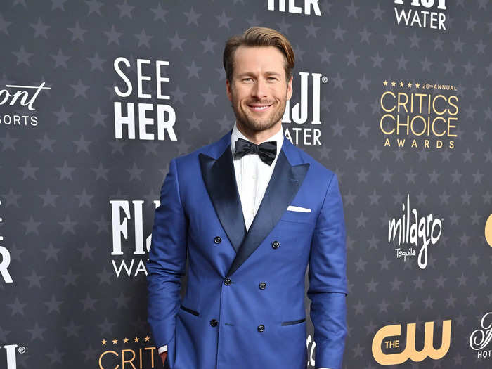 Glen Powell wore a bright-blue suit jacket and matching pants with a white shirt and bow tie.