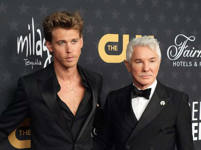 Austin Butler wore an all-black ensemble by Celine and accessorized with Cartier jewelry. He walked the carpet with Baz Luhrmann, who wore a tuxedo.