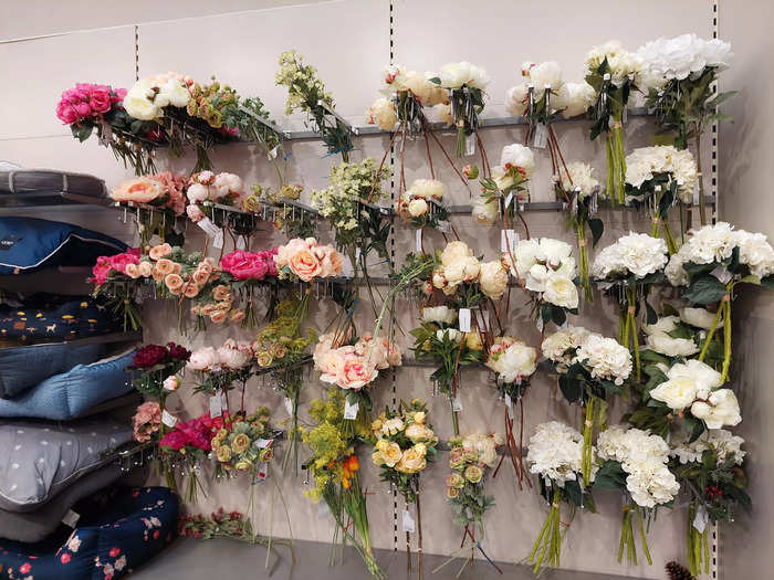 The UK store also had a stand of fake flowers near lots of candles and photo frames.