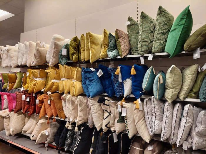 ... including these cushions arranged by color. This was probably the neatest section of the store – likely because fewer customers browse through these items and move them around, unlike with clothes and shoes.