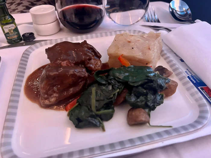 Then, the main course is served. I chose the beef dish, which came with sauteed spinach, roasted mushrooms, and potatoes.