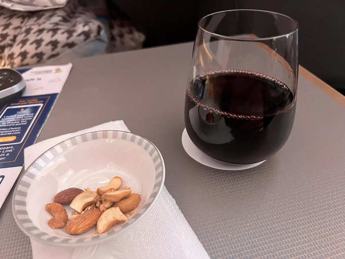 The great service continued shortly after takeoff when passengers were served a bowl of nuts and another beverage — I chose wine, which was delicious.
