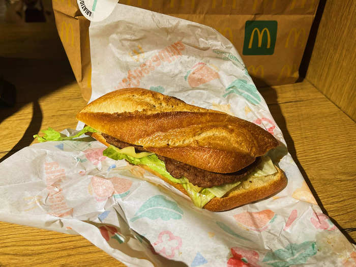 The McBaguette came with two beef patties, lettuce, Swiss cheese, and a smear of mustard on a small baguette-like roll.