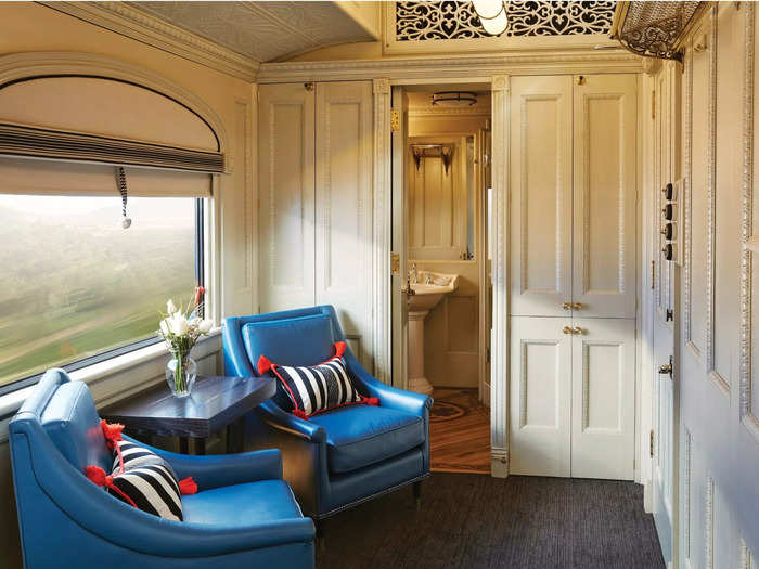 Suite cabins onboard the Andean Explorer train are ornately decorated and include a double bed, closet, and an en-suite bathroom.