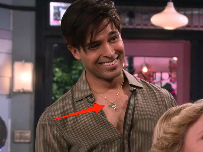 Fez wears a hairdryer necklace.