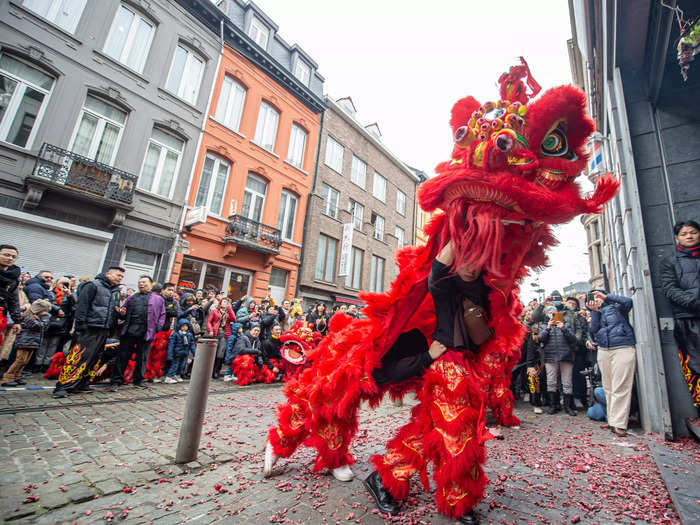 In Antwerp, Belgium, people gathered to watch traditional dragon dancers in action.