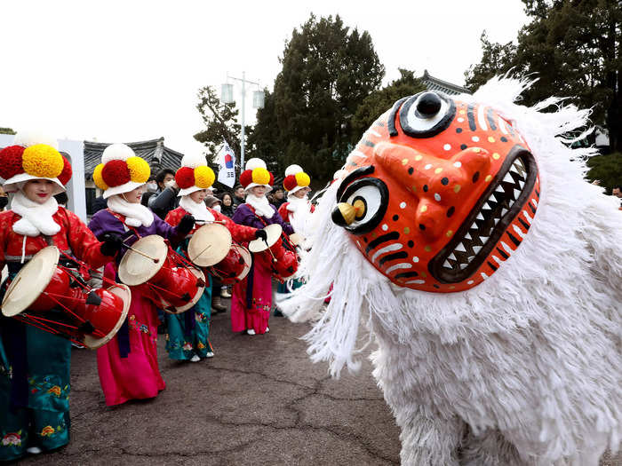 In South Korea, people travel from large cities to their hometowns for the Lunar New Year holidays to pay respect to the spirits of their ancestors.