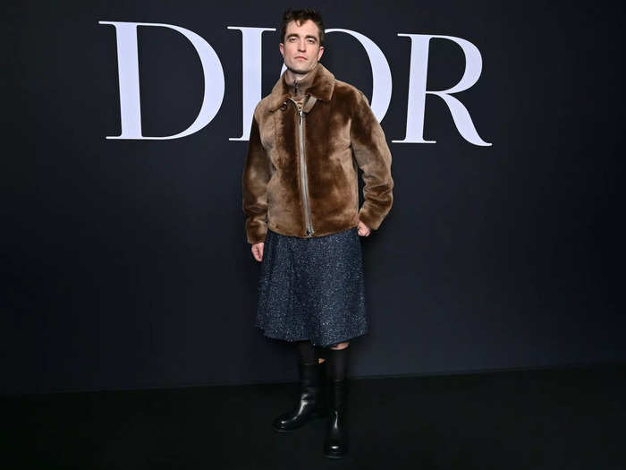 Robert Pattinson wore a sparkly skirt to the Dior show.