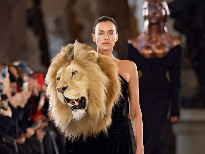 Both Irina Shayk and Kylie Jenner wore black gowns with massive, faux lion heads attached at the neckline.