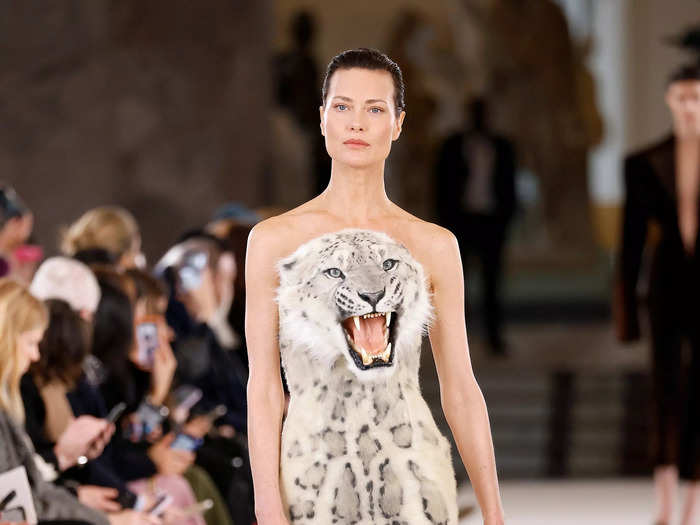 The event quickly became controversial, as three models walked the runway in dresses adorned with realistic animal heads.