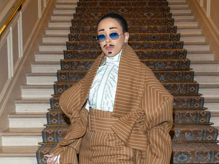 Doja Cat opted for a striped suit with high-waisted trousers and an oversized jacket.