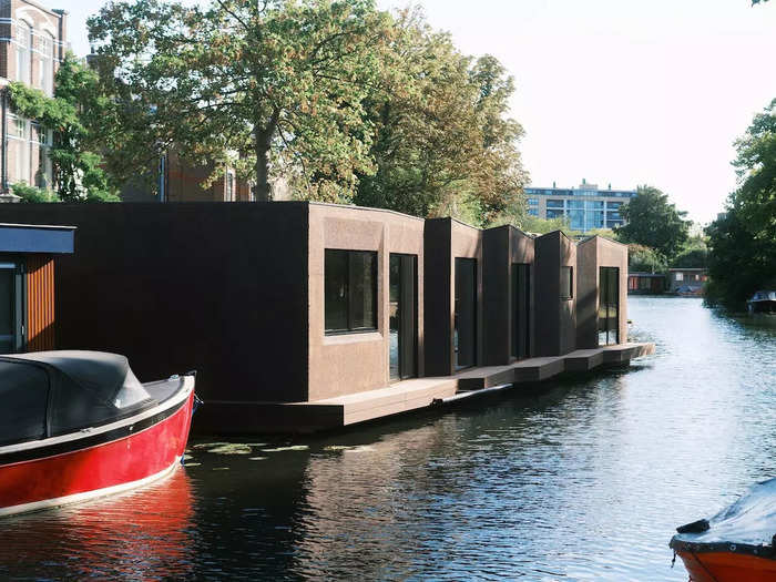 Floating houses are a common sight in the Netherlands, but one that was built for a millennial couple in the city of Leiden stands out from its neighbors due to its origami-like facade.