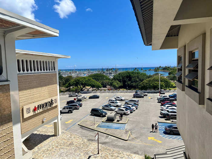 The shopping center looks out at views of the Honolulu Harbor and the city skyline.