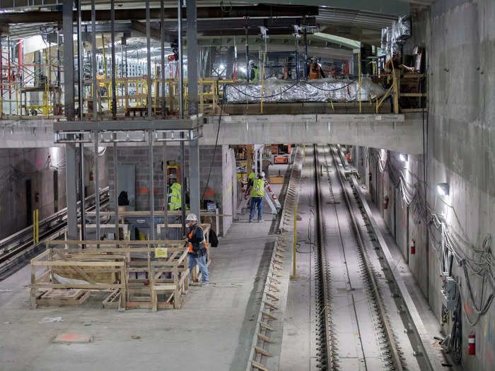 ... yet progress continued more than a decade after the project began. By 2018, construction had moved forward significantly, adding rails, a platform and a mezzanine to the once bare bones hole underground.