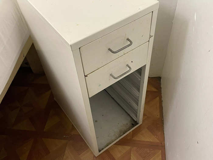 Upon further inspection, I realized that the white side table was an old filing cabinet.