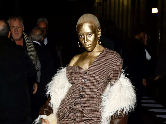 Doja Cat was a vision of gold while at the A.W.A.K.E Mode womenswear show during the Paris Fashion Week in October 2022.