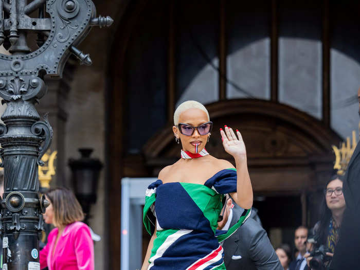 Her love of face paint continued during Paris Fashion Week in October 2022 when she visited the Thom Browne show.