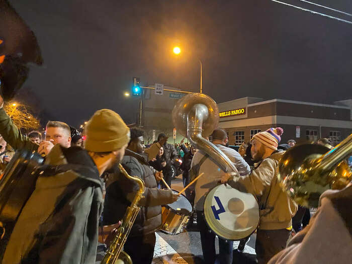 A horn section served as the grand marshal of an impromptu parade of Eagles fans for a few blocks.