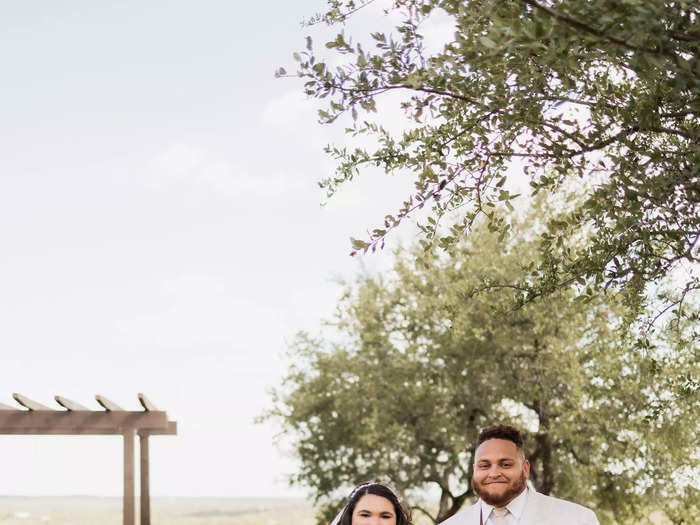 Elise paired a long veil with her dress.