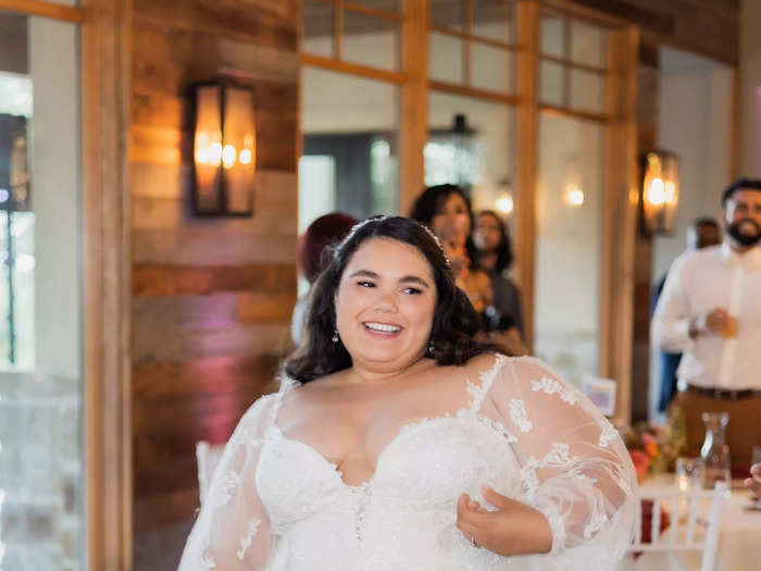 Elise added custom, sheer sleeves to the gown to make it her own.