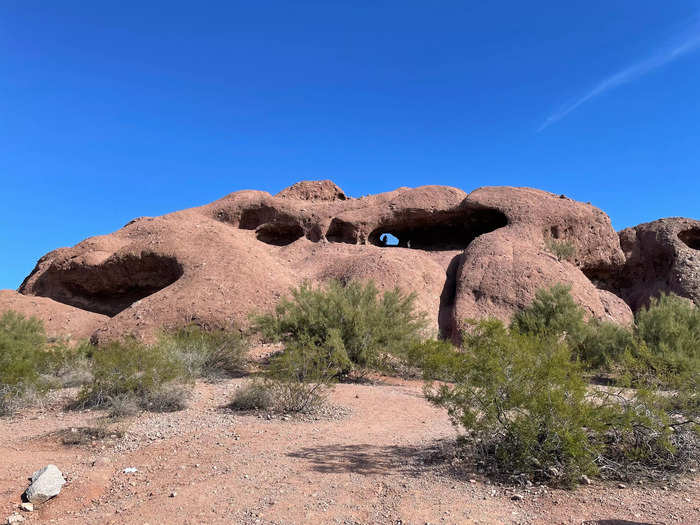 Climb to a scenic rock formation in Papago Park.