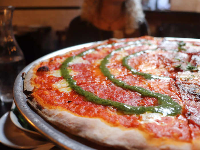 Rubirosa is famous for its tie-dye pizza, which features vodka sauce, tomato sauce, pesto, and fresh mozzarella. So we had to try it.