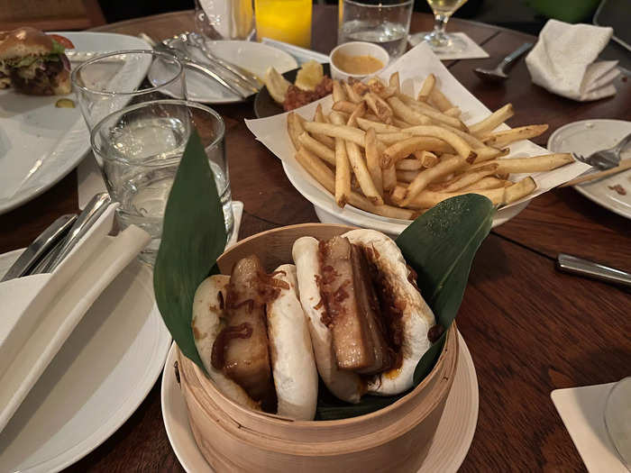 I thought the food at Spago, which is by celebrity chef Wolfgang Puck, was delicious. I tried the burger, Japanese chicken wings, a juicy steak, and pork bao — my favorite of the four.