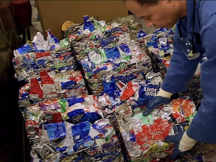 Cubes of aluminum trash are stored in a refrigerator to prevent the smell from spreading to other parts of the ship for up to seven days.