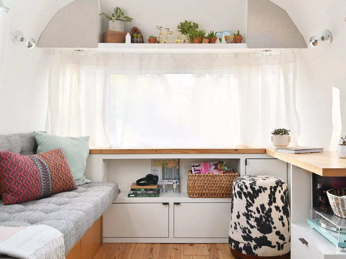 The Airstream has everything you would expect to find in a home, but on a smaller scale: a living area, a kitchenette, sleeping quarters, and a bathroom.