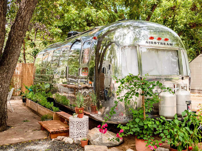 The couple took about 18 months to turn the Airstream into a tiny home. But they moved into the vehicle before it was completed.