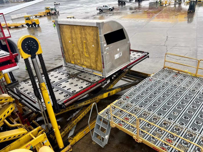 The entry is high above the ground, so agents have to use giant platforms to rise and lower the freight.