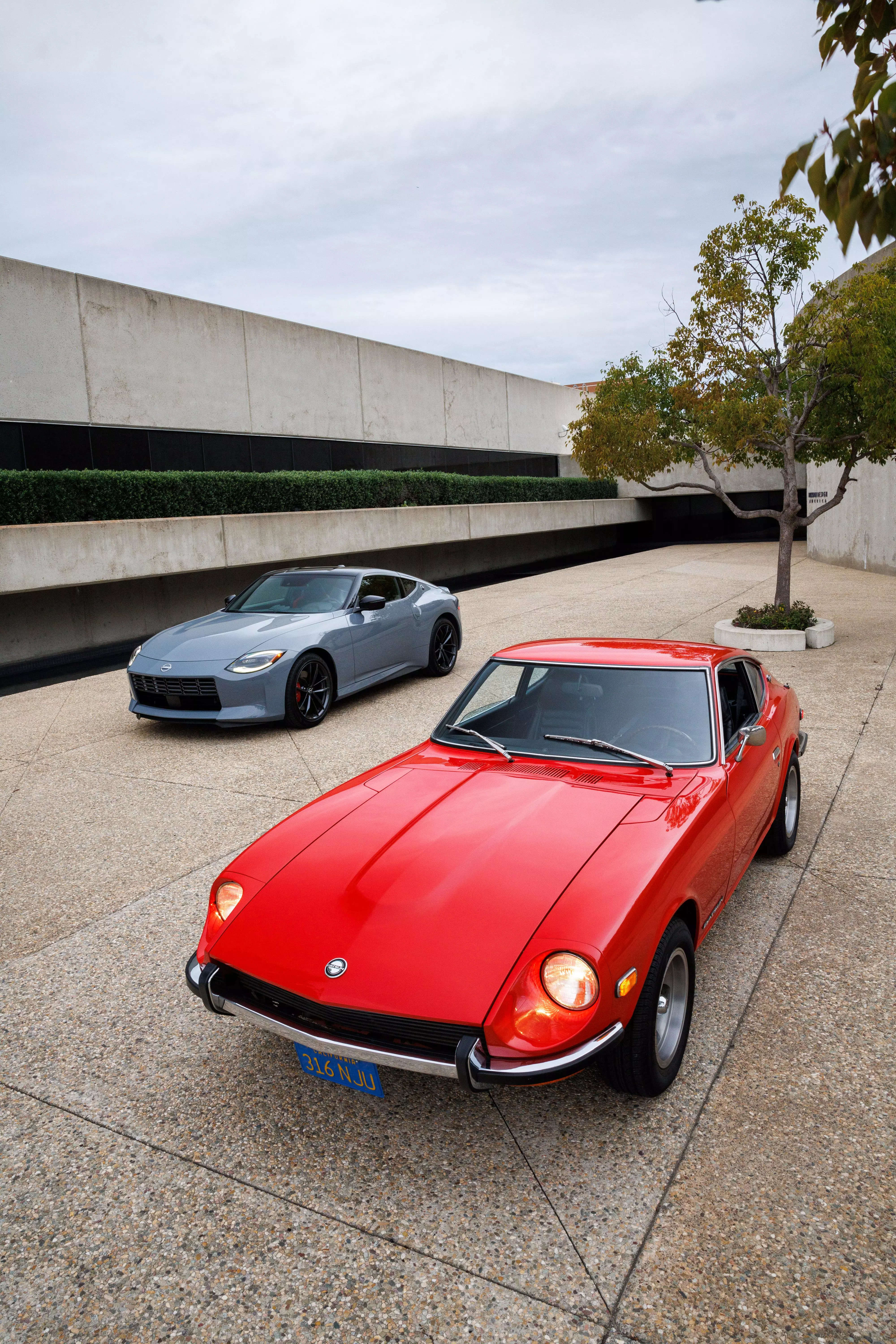 The new Nissan Z with the original Datsun 240Z