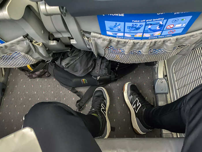 The seat pitch was between 27 and 32 inches, according to the representative. I thought I had enough legroom even with my backpack shoved underneath the seat.