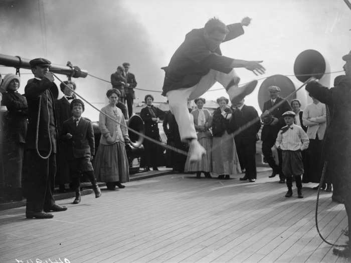 Guests could play games out on deck. This was a high jump contest on the Franconia.