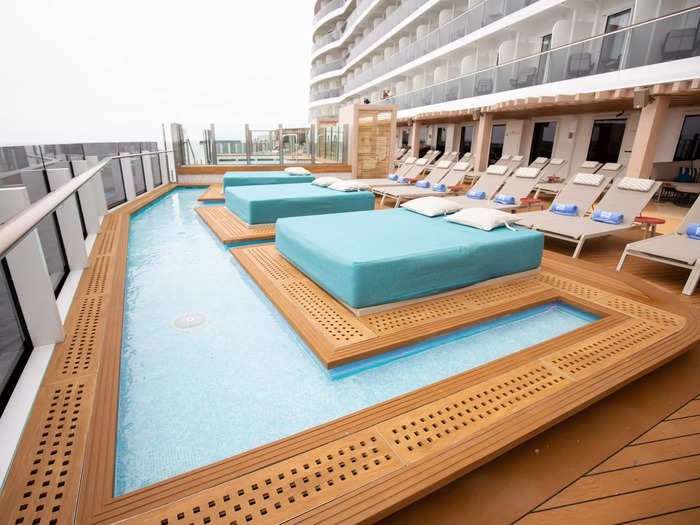 Luckily, there were other options for pool-side lounging: an outdoor walkway with pools, lounge chairs, daybeds, and panoramic views of the ocean.