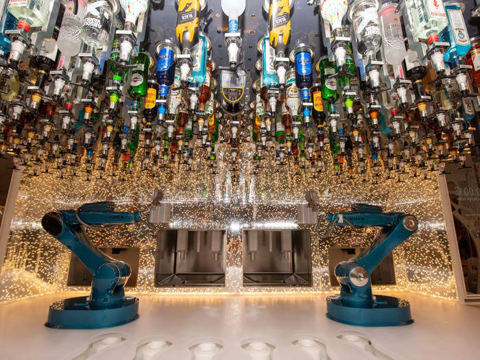 … a bar operated by robotic arms …