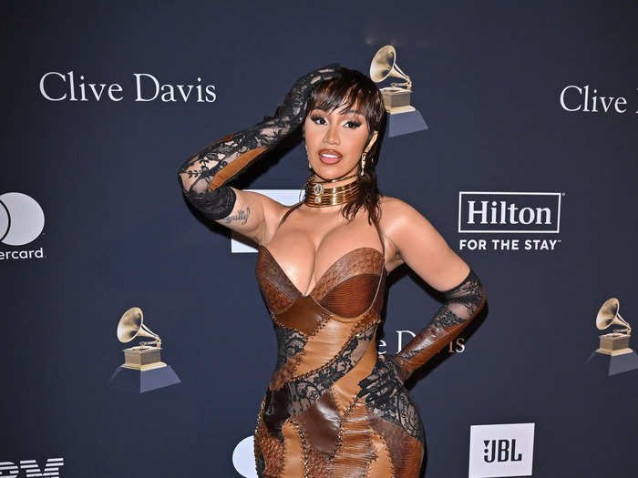 Cardi B wore a patchwork gown that appeared to be made with pieces of leather and lace.