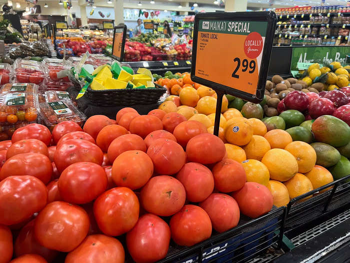 Local tomatoes at Foodland start at  around $3 a pound, which is cheaper than the $3.24 price from 2022.