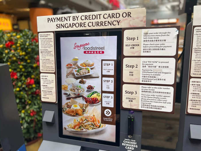 Passengers can self-order from kiosks using a credit card or Singaporean dollars — you cannot pay in USD or other paper currency.