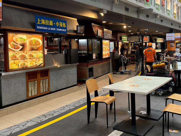 The "street" is not actually outside the airport but is a line of over a dozen booths inside terminal 3 serving traditional dishes from places like Singapore, Vietnam, and China.