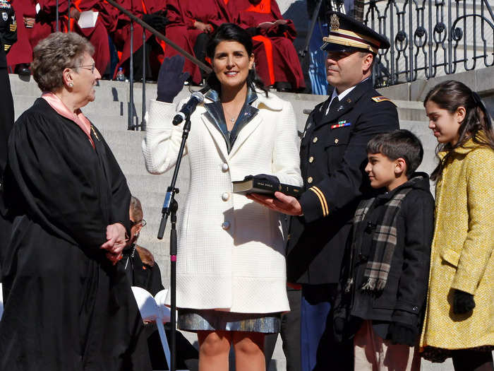 January 2011: Michael held the family Bible as Nikki was sworn in as governor of South Carolina.