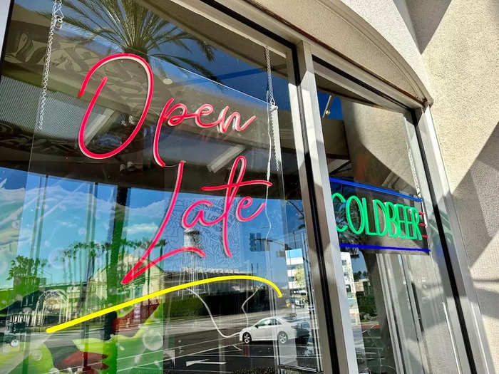 The Anaheim restaurant promotes its late-night hours with a neon sign. Select locations sell beer, wine, and hard seltzers.