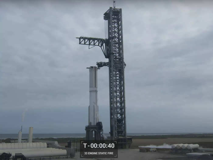 The Super Heavy booster, designed to heave the Starship rocket into orbit, was strapped to framework on a launch pad at the company