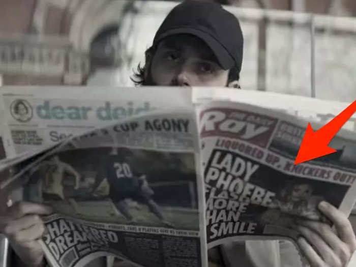 The newspaper Joe is holding has an article about Lady Phoebe on the front page.